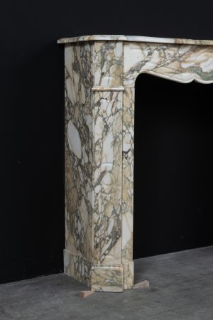 Small Antique Fireplace in Breche Marble.