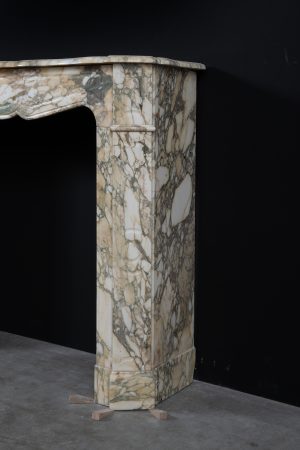 Small Antique Fireplace in Breche Marble.