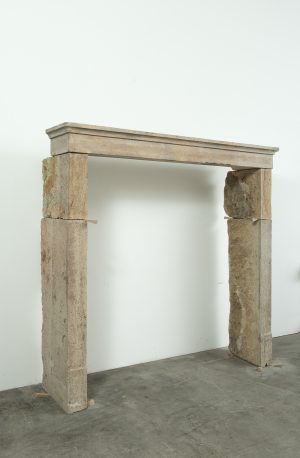 Rustic French Limestone Fireplace
