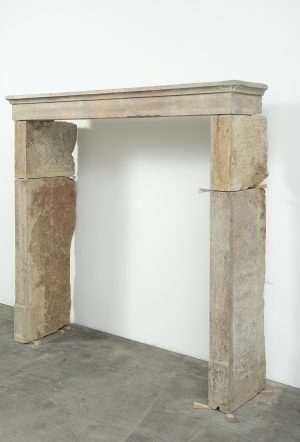 Rustic French Limestone Fireplace