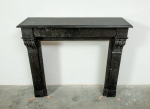 Antique Black Marble Corbel Fireplace Mantel with Fossil Inclusions
