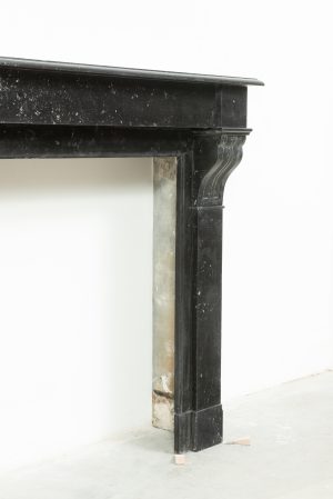 Antique Black Marble Corbel Fireplace Mantel with Fossil Inclusions