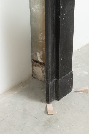 Antique Black Marble Corbel Fireplace Mantel with Fossil Inclusions