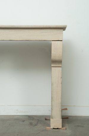 Light Limestone Console Fireplace Mantel.
