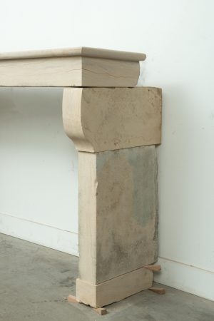 Light Limestone Console Fireplace Mantel.