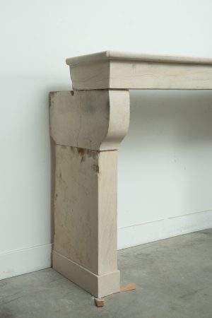 Light Limestone Console Fireplace Mantel.