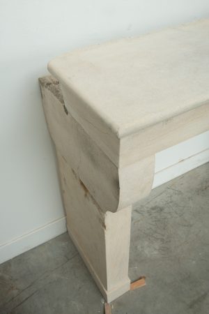 Light Limestone Console Fireplace Mantel.