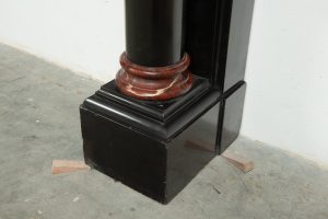 Late 19th-Century Black Marble Fireplace Mantel.