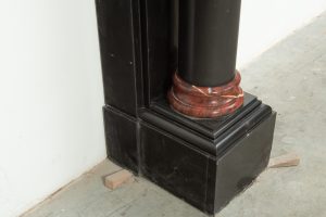 Late 19th-Century Black Marble Fireplace Mantel.