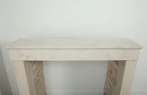 Antique limestone fireplace mantel