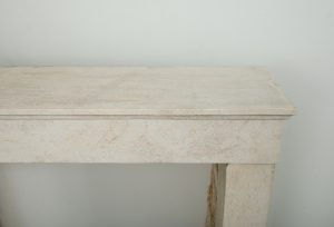 Antique limestone fireplace mantel
