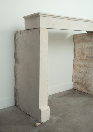 Antique limestone fireplace mantel