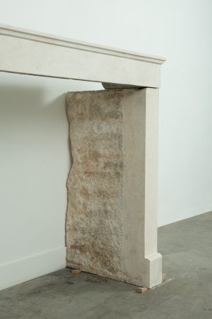 Antique limestone fireplace mantel