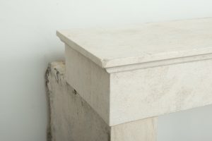 Antique limestone fireplace mantel