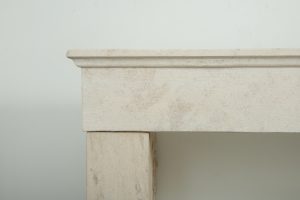 Antique limestone fireplace mantel